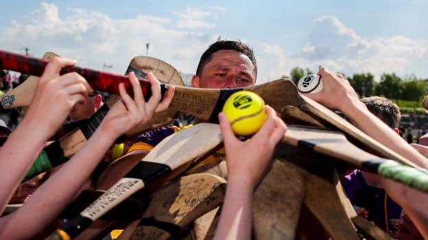 Lee Chin of Wexford signs autographs for supporters after the Leinster GAA Hurling Senior Championship Round 4 match between Carlow and Wexford at Netwatch Cullen Park in Carlow. Photo by Michael P Ryan/Sportsfile.