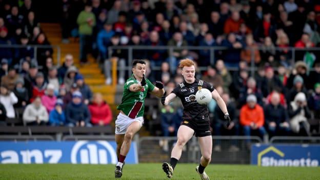Danny Magill, Down, and David Lynch, Westmeath, in Allianz Football League action. Photo by Seb Daly/Sportsfile