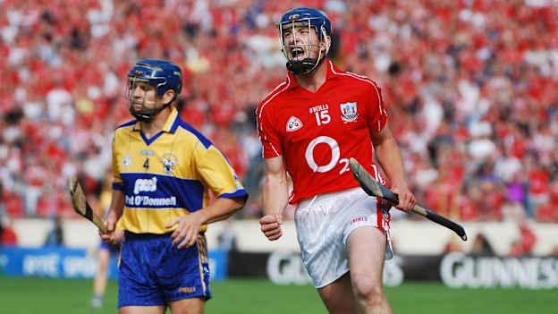 Patrick Horgan, Cork, celebrates a late score as Gerry O'Grady, Clare, looks on during the 2008 GAA Hurling All-Ireland Senior Championship Quarter-Final, Clare v Cork, Semple Stadium, Thurles, Co. Tipperary. Picture credit: Dáire Brennan / SPORTSFILE
