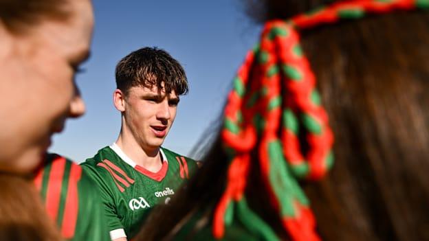 Sam Callinan of Mayo signs autographs for supporters after the 2024 GAA Football All-Ireland Senior Championship Round 2 match between Roscommon and Mayo at Dr Hyde Park in Roscommon. Photo by Ben McShane/Sportsfile