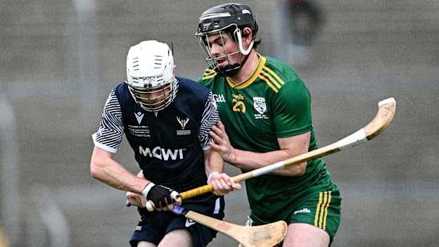 Gerard Walsh of Ireland is tackled by Ruaridh Anderson of Scotland during the Shinty International match between Ireland and Scotland at Cusack Park in Ennis, Clare. Photo by Ray McManus/Sportsfile.