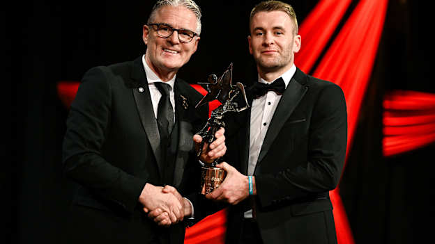 Tipperary's John McGrath is presented with the PwC GAA/GPA Hurler of the Year award by Uachtarán Chumann Lúthchleas Gael Jarlath Burns. Photo by Brendan Moran/Sportsfile
