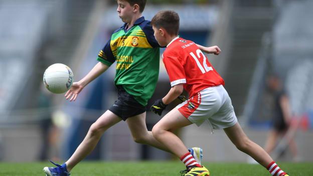 Action from Gaelscoil Bhréifne, Cavan, and SN Bhaile Mhic Airt, Waterford, at the GAAgaeilge Go Games at Croke Park on Monday. Photo by Shauna Clinton/Sportsfile