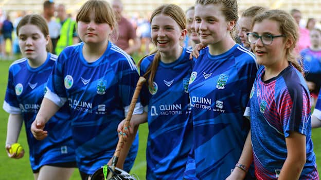 Erin's Own players celebrate after the cup final match between Erin's Own and Barryroe during the 2026 John West Féile na nGael Camogie and Hurling National Finals at Laois Hire O’Moore Park & LOTB Centre Of Excellence in Portlaoise, Laois. Photo by Thomas Flinkow/Sportsfile.