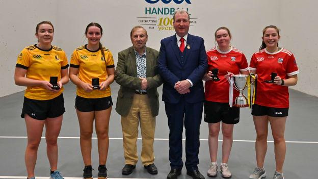 From left: Runners-up Ciara Mahon and Amy Brennan (Kilkenny), Aidan Mulligan, GAA Handball President Conor McDonnell and champions Catriona Casey and Aishling O'Keeffe (Cork). The Cork ladies were presented with the Brídín Uí Mhaolagáin Cup, which was presented by her husband Aidan in memory of the former camogie and handball stalwart. Photo: Stephen Marken
