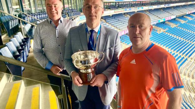 Leinster GAA Chairperson Derek Kent, GAA President Jarlath Burns, and Tyrone GAA delegate Benny Hurl pictured with the Paul McGirr Cup at Croke Park.