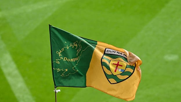 A Donegal flag being waved at the 2025 All-Ireland SFC Final. Photo by Piaras Ó Mídheach/Sportsfile