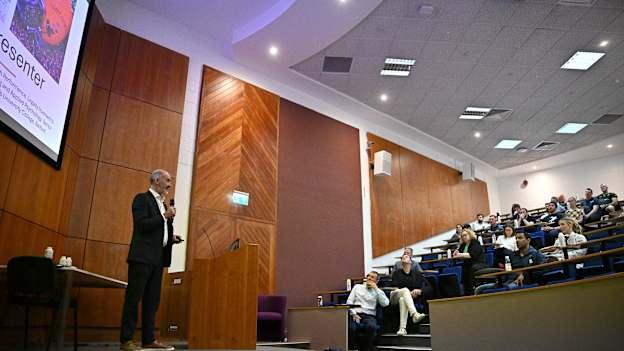 Dr. Ciarán Kearney pictured speaking at the 2024 Gaelic Games Player Welfare Conference. 