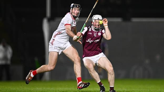 John Fleming, Galway, and Eoin Downey, Cork, in Allianz Hurling League action. Photo by Ben McShane/Sportsfile