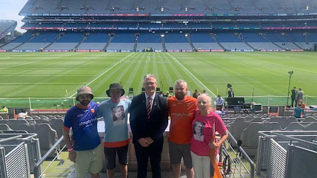 GAA President, Jarlath Burns, centre, pictured welcoming the family of Natalie McNally to Croke Park on All-Ireland Final Sunday. 