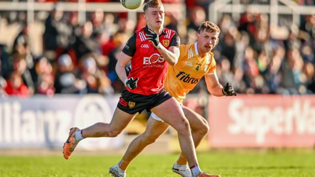 Liam Kerr, Down, and Kavan Keenan, Antrim, in Ulster SFC action. Photo by Ben McShane/Sportsfile