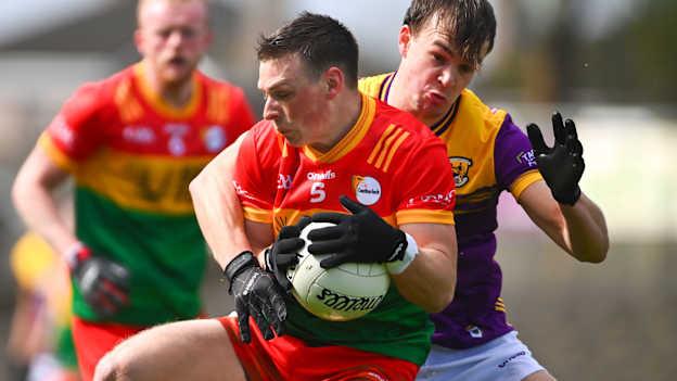 Mikey Bambrick, Carlow, and Liam Coleman, Wexford, in Leinster SFC action earlier this year. Photo by Tyler Miller/Sportsfile