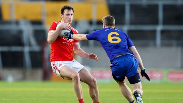 Mark McInerney, Eire Óg Ennis, and Alan O'Connor, St Finbarr's, in AIB Munster Club SFC action. Photo by Michael P Ryan/Sportsfile