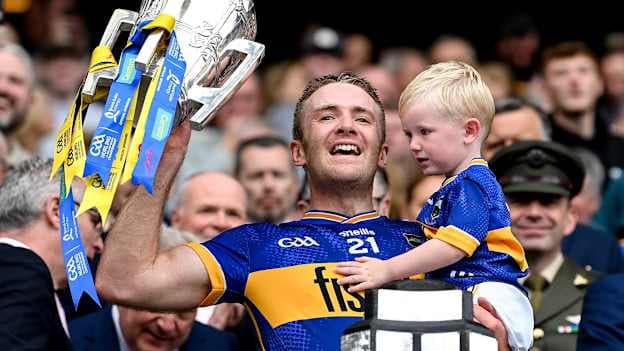 Noel McGrath of Tipperary and his son Sam lift the Liam MacCarthy cup after victory in the 2026 GAA Hurling All-Ireland Senior Championship final match between Cork and Tipperary at Croke Park in Dublin. Photo by Stephen McCarthy/Sportsfile.