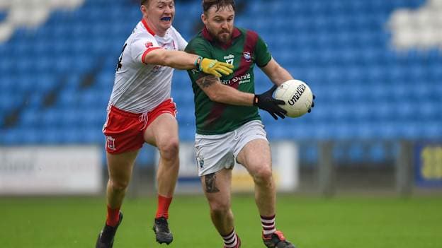 Jordan Fitzpatrick, Portarlington, and Eoghan Byrne, Tinahely, in AIB Leinster Club SFC action. Photo by Tom Beary/Sportsfile