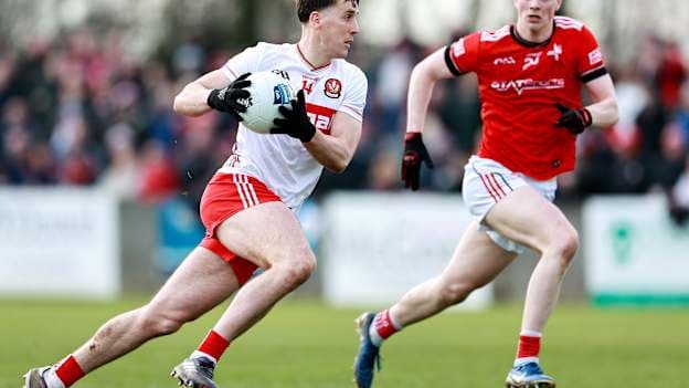 Shane McGuigan, Derry, and James Maguire, Louth, in Allianz Football League action. Photo by Thomas Flinkow/Sportsfile