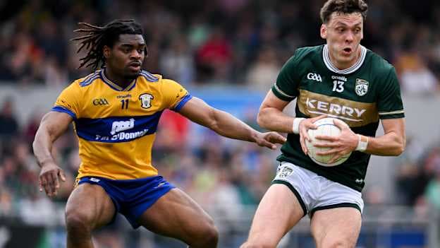 David Clifford, Kerry, and Ikem Ugwueru, Clare, in Munster SFC action. Photo by Paul Phelan/Sportsfile