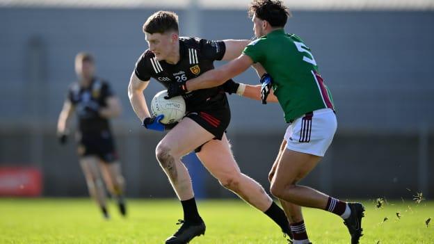 Odhran Murdock, Down, and Andy McCormack, Westmeath, in Allianz Football League action. Photo by Seb Daly/Sportsfile