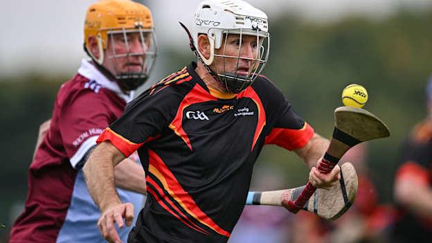 Paddy Roe of Erin's Own Castlecomer, Kilkenny in action against Roger Nolan of Naomh Olaf's Social Hurlers, Dublin, during the Dads & Lads Hurling Blitz at the GAA National Sports Campus in Abbottstown, Dublin. Photo by Stephen Marken/Sportsfile.