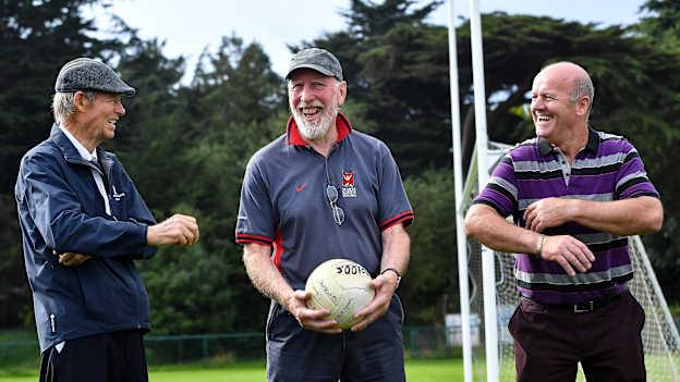 Mícheál Ó Muircheartaigh with former Dublin footballer Brian Mullins, centre, and former Kerry footballer Jack O'Shea at UCD during the reunion of club and intercounty GAA players trained by Mícheál Ó Muircheartaigh as part of a training group of Dublin based players in the 1970, '80's and '90's at UCD in Belfield, Dublin. Photo by Piaras Ó Mídheach/Sportsfile.
