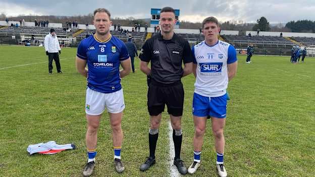 Wicklow captain Dean Healy, referee Diarmuid Boylan, and Waterford captain Conor Murray ahead of throw-in before their Allianz Football League Division 4 match. 