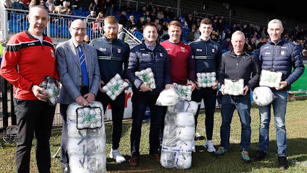 National Hurling Development Committee Chairperson Terry Reilly presents Antrim clubs Clooney Gaels, Tir na nÓg Randalstown, Ruairí Óg Cushendall, and Naomh Padraig with their Táín Óg kit. Pictured also is Antrim Senior Hurlers Niall McKenna, Niall O’Connor and Antrim Chairperson Seamus McMullan.