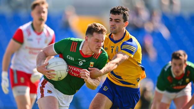 Mattie Ruane, Mayo, and Ciarán Lennon, Roscommon, in All-Ireland SFC action. Photo by Ben McShane/Sportsfile