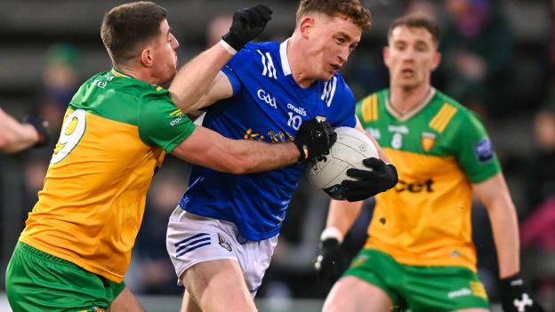 Ciarán Brady, Cavan, and Dáire O'Baoill, Donegal, in Allianz Football League action. Photo by Stephen McCarthy/Sportsfile
