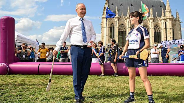 Tánaiste, Minister for Foreign Affairs and Minister for Defence, Micheál Martin, TD, in conversation with Maud Pradella of Paris Gaels at Fesport Festival at the Cháteau de Vincennes during the 2024 Paris Summer Olympic Games in Paris, France. Photo by Sam Barnes/Sportsfile.