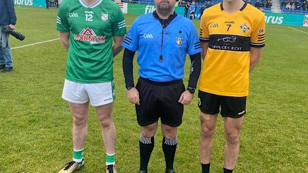 Captains James Laverty and Niall Delargy pictured with referee Kevin Parke at Corrigan Park. Photo by Antrim GAA