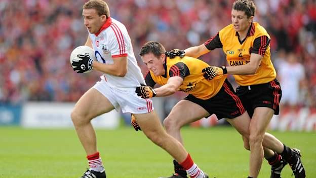 Ciaran Sheehan, Cork, in action against Conor Garvey and Damian Rafferty, Down during the 2010 GAA Football All-Ireland Senior Championship Final. Picture credit: Oliver McVeigh / SPORTSFILE