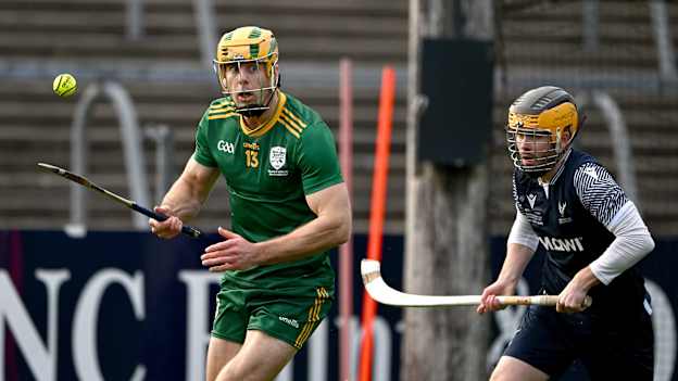 Dan Morrissey of Ireland races clear of Lachie Shaw of Scotland during the 2024 Hurling-Shinty International match between Ireland and Scotland at Cusack Park in Ennis, Clare. Photo by Ray McManus/Sportsfile.