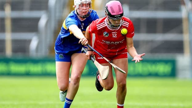 Emma Murphy, Cork, and Sarah Corcoran, Tipperary, in Glen Dimplex Camogie Championship action.