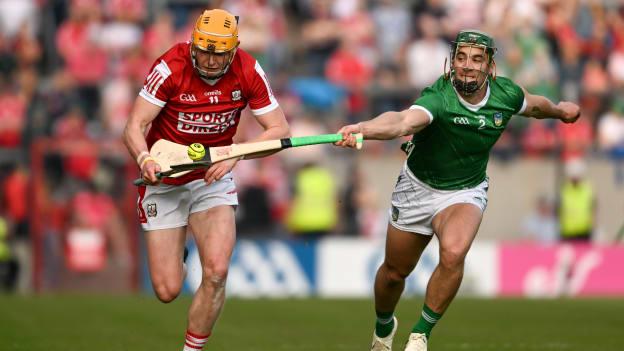 Shane Barrett, Cork, and Seán Finn, Limerick, in Munster SHC action. Photo by Daire Brennan/Sportsfile