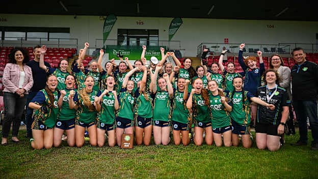Claregalway players celebrate with the trophy after their side's victory in the final match between Claregalway and Ballinderry Shamrocks at the John West Féile Peile na nÓg Gaelic Football and LGFA National Finals at the Find Insurance Owenbeg Derry GAA Centre in Owenbeg, Derry. Photo by Shauna Clinton/Sportsfile.