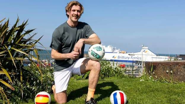 Derry footballer, Anton Tohill, is spending eight weeks coaching Gaelic games in clubs and schools across Spain and Portugal as part of the International Player Exchange Programme.