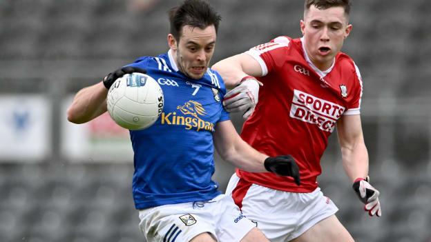 Gerard Smith, Cavan, and Luke Fahy, Cork, in Allianz Football League action. Photo by Piaras Ó Mídheach/Sportsfile