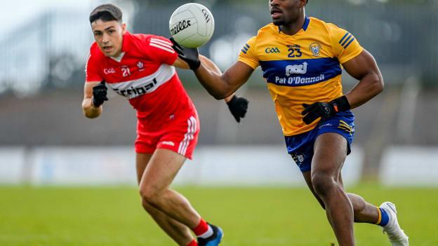 Ikem Ugwueru of Clare in action against Ben McCarron of Derry during the GAA Football All-Ireland Senior Championship Round 3 match between Derry and Clare at Glennon Brothers Pearse Park in Longford. Photo by Stephen Marken/Sportsfile