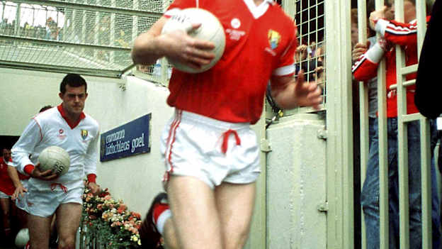 Cork captain Larry Tompkins, followed by team-mate John Kerins, leads his side onto the pitch prior to the 1990 All-Ireland Senior Football Championship Final match between Cork and Meath at Croke Park in Dublin. Photo by Ray McManus/Sportsfile.