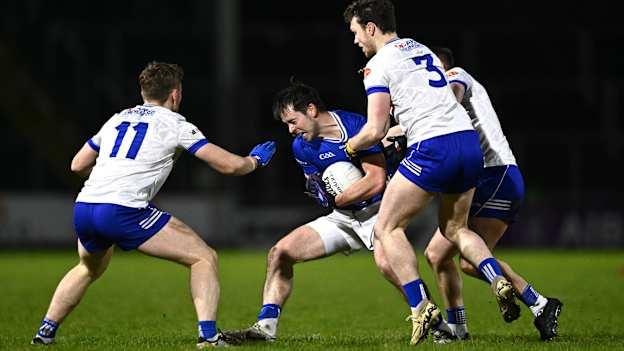 Gerard Smith, Cavan, surrounded by Monaghan players, Micheal Bannigan, Killian Lavelle, and Ryan Wylie at Kingspan Breffni. Photo by Ben McShane/Sportsfile