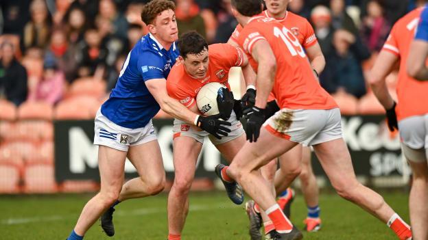 Aaron McKay, Armagh, and Ciarán Brady, Cavan, in Allianz Football League action. Photo by Oliver McVeigh/Sportsfile