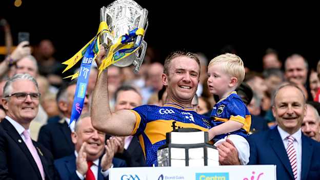 Noel McGrath of Tipperary and his son Sam lift the Liam MacCarthy cup after victory in the GAA Hurling All-Ireland Senior Championship final match between Cork and Tipperary at Croke Park in Dublin. Photo by Stephen McCarthy/Sportsfile.