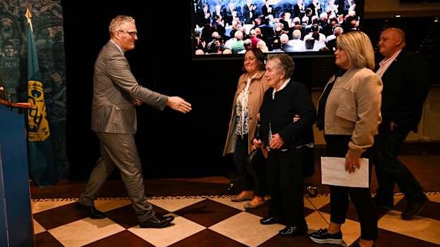 Uachtarán Chumann Lúthchleas Gael Jarlath Burns greets Bridie Brown, the wife of Sean Brown, and his family during day one of GAA Congress at The Abbey Hotel, Donegal. Photo by Ramsey Cardy/Sportsfile
