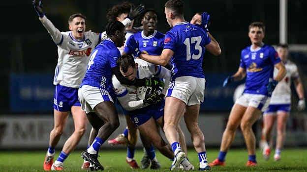 Jason Irwin of Monaghan in action against Favour Shehu, left, and Peter Corrigan of Cavan during the Bank of Ireland Dr McKenna Cup match between Cavan and Monaghan at Kingspan Breffni in Cavan. Photo by Ramsey Cardy/Sportsfile.