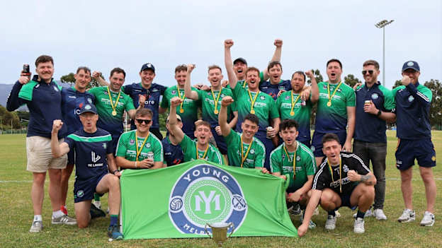 Young Melbourne's  footballers celebrate after winning the 2025 Australian Regional Games in Tasmania. 