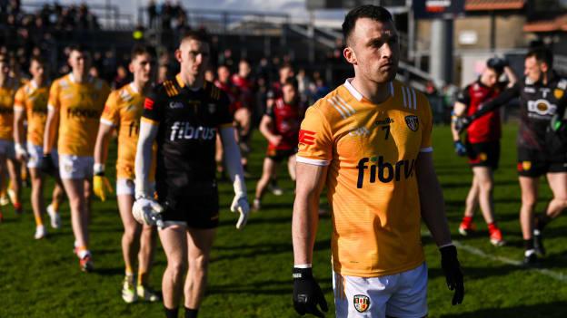 Dermot McAleese leads the Antrim team on the pre-match parade ahead of the 2024 Ulster SFC encounter against Down. Photo by Ben McShane/Sportsfile