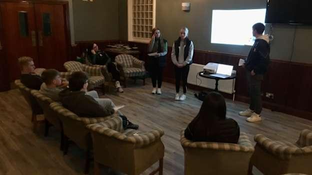 Participants during a module two presentation.