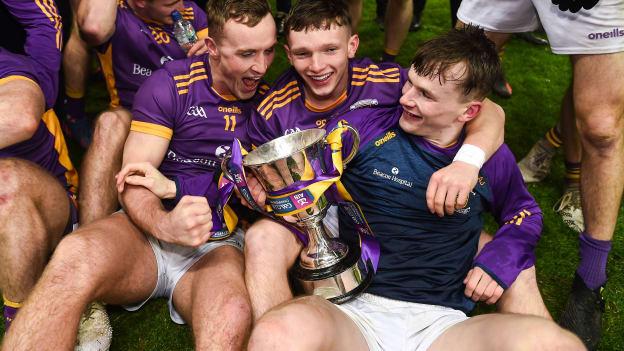 Kilmacud Crokes players, left to right, Shane Cunningham, Padraic Purcell and Michael Mullin celebrate after the AIB Leinster GAA Football Senior Club Championship Final match between Kilmacud Crokes of Dublin and The Downs of Westmeath at Croke Park in Dublin. 