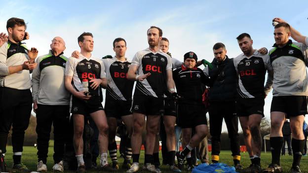 Captain Adrian Moyles talks to the rest of the St Kiernans players following the game.