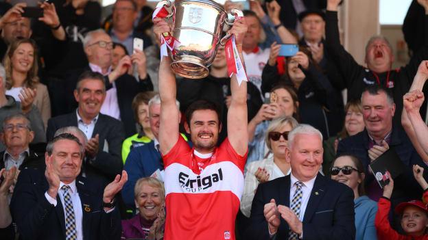 Chrissy McKaigue raises the Anglo-Celt cup following Derry's Ulster SFC Final victory.